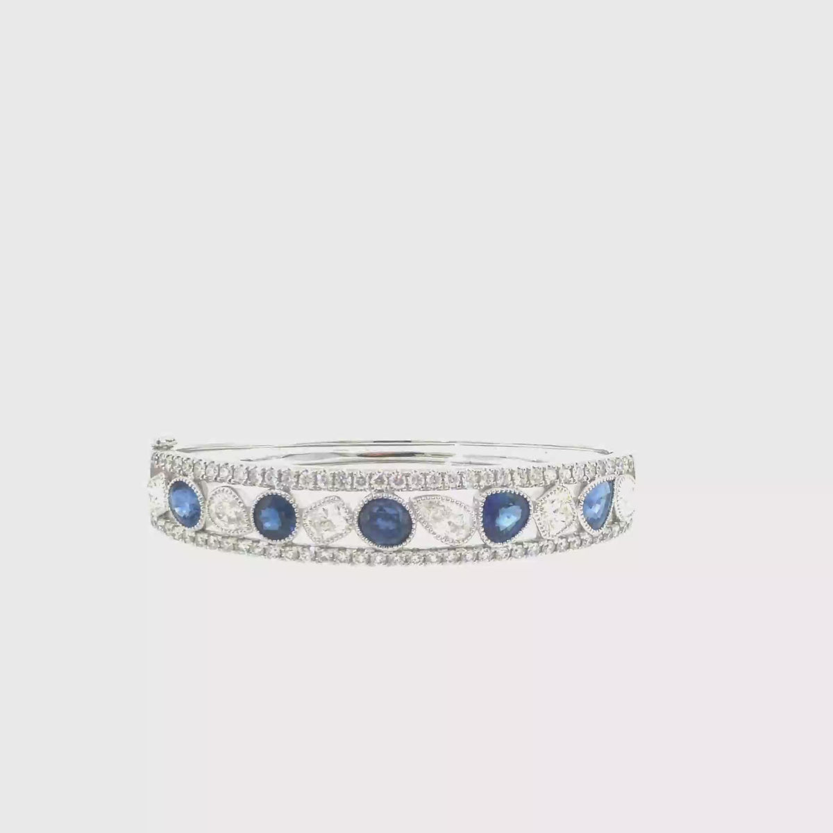 360 video of The Sapphire Monarch Bangle, 12.00ct Sapphire & Diamond, 14K White Gold by Benji Designs
