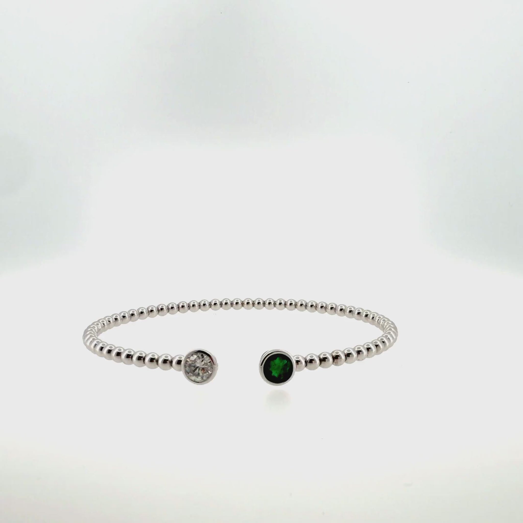360 video of The Emerald Duet Bangle, 0.60ct Emerald & 0.60ct Diamond, 14K White Gold by Benji Designs