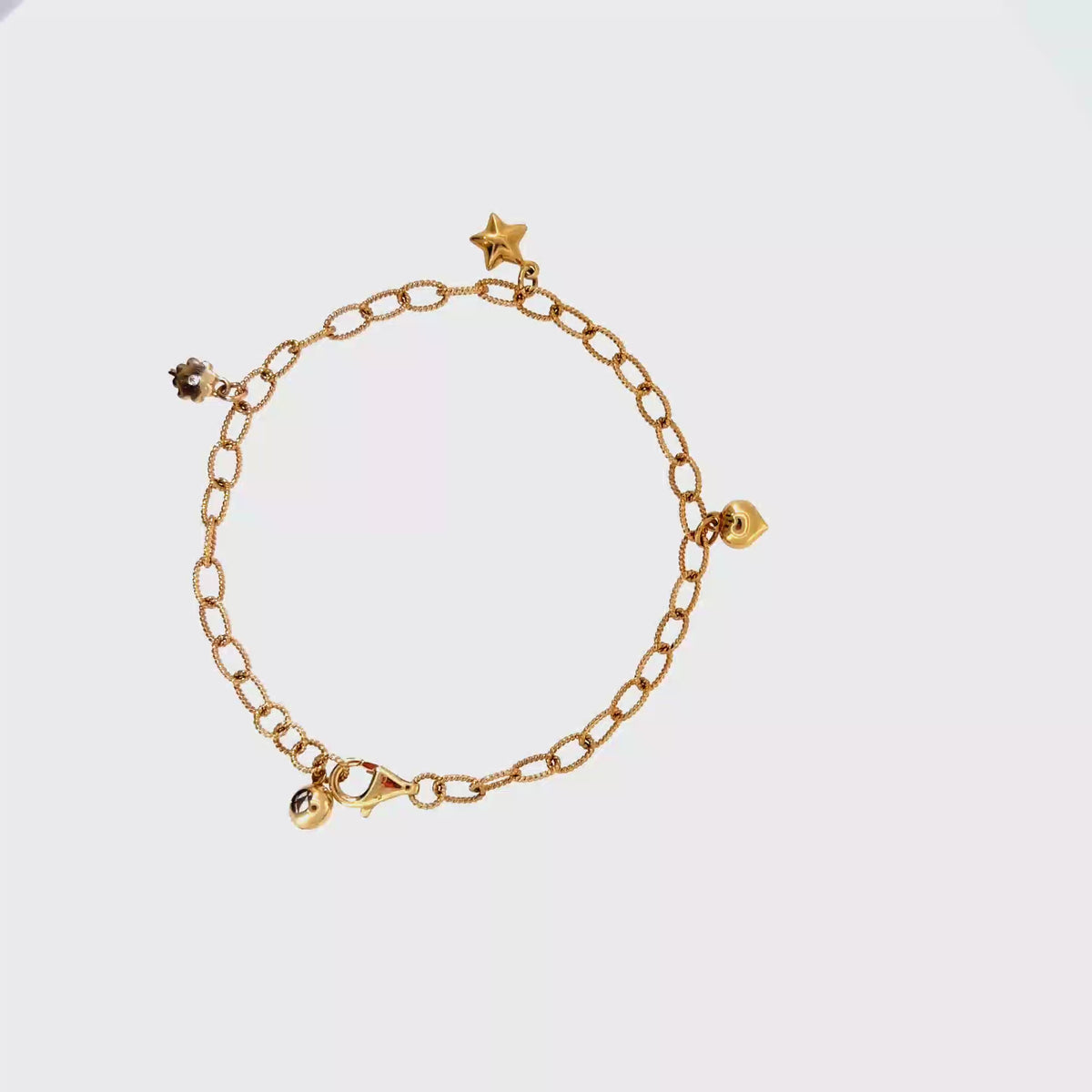 360 video of The Wishing Star Charm Bracelet, 14K Yellow Gold by Benji Designs