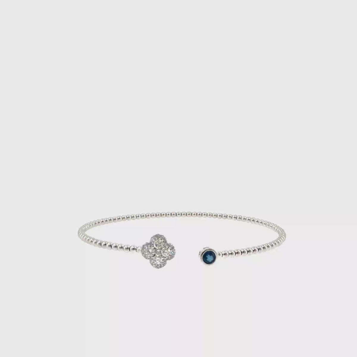 360 video of The Sapphire Dewdrop Bangle, 0.51ct Sapphire & Diamond, 14K White Gold by Benji Designs