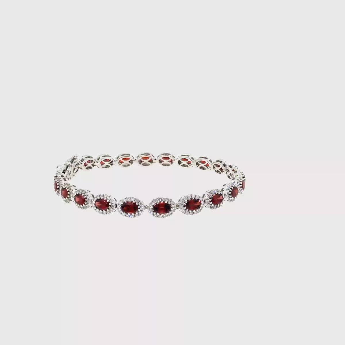 360 video of The Garnet Halo Tennis Bracelet, 8.89 ct Garnet & Diamond, 14K White Gold by Benji Designs