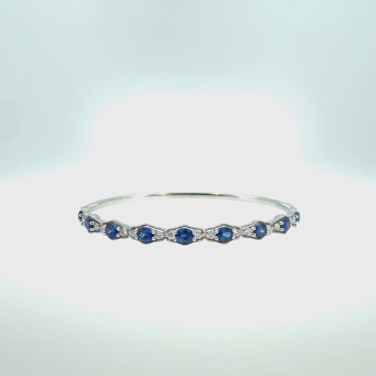 360 video of The Heirloom Sapphire Bangle, 2.83ct Sapphire & Diamond, 18K White Gold by Benji Designs